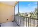 Screened balcony with a view of the palm trees and surrounding community at 8403 Placida Rd # 304, Placida, FL 33946