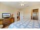 Bedroom with a queen-sized bed, bathroom, television, and dining room at 8403 Placida Rd # 304, Placida, FL 33946