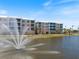 Condo exterior showcasing serene lake views from private patios, perfect for relaxed living and picturesque scenery at 8403 Placida Rd # 304, Placida, FL 33946
