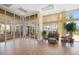 An inviting lobby featuring ample seating areas, expansive windows, and access to outdoor amenities at 8403 Placida Rd # 304, Placida, FL 33946