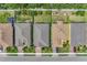 Aerial view of residential neighborhood highlighting roof lines and property lines at 8997 Excelsior Loop, Venice, FL 34293