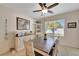 Inviting dining room with stylish furniture, ample natural light, and decorative accents at 8997 Excelsior Loop, Venice, FL 34293