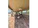 Community pool lounge with outdoor kitchen at 8997 Excelsior Loop, Venice, FL 34293