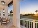 Spacious balcony provides seating and gorgeous views of the sunset and the ocean at 9810 Eagle Preserve Dr, Englewood, FL 34224