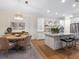 Beautiful kitchen with open floor plan, marble countertops, and ample storage, perfect for Gathering gatherings at 9810 Eagle Preserve Dr, Englewood, FL 34224
