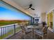 Relax and unwind on the patio with views of water and the golf course at 9810 Eagle Preserve Dr, Englewood, FL 34224