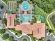 A bird's eye view of the clubhouse with its multiple pools, amenity center, and putting green, all exquisitely maintained at 11186 Batello Dr, Venice, FL 34292