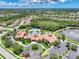 An aerial view displays Venetian Falls' luxurious amenities and meticulously planned community layout at 11186 Batello Dr, Venice, FL 34292