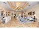 Inviting lobby area with tile flooring, elegant seating, and ample natural light at 11186 Batello Dr, Venice, FL 34292