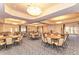 Large community meeting room with ample seating for events and gatherings at 11186 Batello Dr, Venice, FL 34292