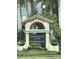 Venice, Florida, sign near tropical palms, advertising shopping opportunities at 11186 Batello Dr, Venice, FL 34292