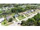 Stunning aerial view showcases the neighborhood homes and waterway access, ideal for outdoor living at 1124 W Hillsborough Blvd, North Port, FL 34288