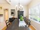 Modern dining room featuring a large table, stylish decor and lots of natural light at 1124 W Hillsborough Blvd, North Port, FL 34288