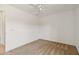 Bedroom boasting neutral carpeting, fresh white walls and ceiling fan at 113 Mark Twain Ln, Rotonda West, FL 33947