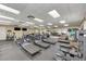 Well-equipped fitness center with treadmills, weights, and exercise machines, promoting a healthy lifestyle at 11437 Dancing River Dr, Venice, FL 34292