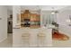 Eat-in kitchen with breakfast bar, modern appliances, and a convenient breakfast nook with natural light at 11437 Dancing River Dr, Venice, FL 34292