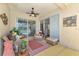 Cozy lanai featuring comfortable seating arrangements and access to the outdoors at 11437 Dancing River Dr, Venice, FL 34292