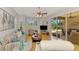 Spacious living room with patio access, recessed lighting, and stylish, modern decor at 11437 Dancing River Dr, Venice, FL 34292