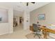 Comfortable office space with desk, chair, and natural lighting; perfect for productivity at 11437 Dancing River Dr, Venice, FL 34292