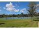 Community tennis courts with well maintained tennis courts and a beautiful manicured lawn at 11455 Fort Lauderdale Pl, Venice, FL 34293