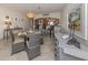 Charming dining area showcases a round table, seating for four, and stylish decor at 1150 Tarpon Center Dr # 3G 307, Venice, FL 34285