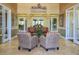 Inviting lobby with comfortable seating and warm decor, creating a welcoming atmosphere at 11610 Dancing River Dr, Venice, FL 34292