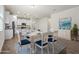 Eat-in dining area featuring a table for six, and an open view to the kitchen at 11711 Alessandro Ln, Venice, FL 34293