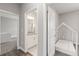 Bathroom with granite countertop, white cabinets, and modern fixtures at 12199 Xavier Ave, Port Charlotte, FL 33981