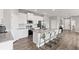 Well-equipped kitchen boasting granite countertops, stainless steel appliances, and a breakfast bar at 12199 Xavier Ave, Port Charlotte, FL 33981