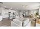 Open floor plan showcases the seamless flow between the living room, kitchen, and dining area at 12199 Xavier Ave, Port Charlotte, FL 33981