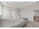 Spacious main bedroom featuring a tray ceiling, neutral colors and carpeted floor at 12199 Xavier Ave, Port Charlotte, FL 33981