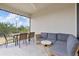 Inviting outdoor patio with comfortable seating and a dining area, perfect for relaxing or entertaining at 12199 Xavier Ave, Port Charlotte, FL 33981