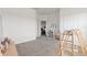 Bright playroom with neutral carpet, play equipment, offering a versatile space for creative activities at 12199 Xavier Ave, Port Charlotte, FL 33981