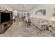 Inviting living room boasts stylish furnishings, an entertainment center, and an open layout at 12515 Felice Dr, Venice, FL 34293