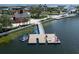 Waterfront dock with kayaks and seating available for neighborhood residents at 12515 Felice Dr, Venice, FL 34293