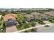 Charming single-Gathering homes with two car garages, brick driveways, and well-manicured lawns at 12897 Oriago St, Venice, FL 34293