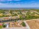 Sprawling community featuring waterfront homes, lush trees, and easy access to nearby highways and bridges at 13648 Clara Ln, Port Charlotte, FL 33981