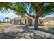 A charming single-story home featuring beautiful stone accents, a garage, and a well maintained lawn at 13648 Clara Ln, Port Charlotte, FL 33981