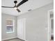 Bedroom features wood floors, ceiling fan and a large closet at 140 Hermes Rd, Venice, FL 34293