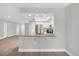 Modern kitchen features granite countertops and stainless steel appliances at 140 Hermes Rd, Venice, FL 34293