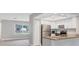 Modern kitchen with stainless steel appliances and granite countertops at 140 Hermes Rd, Venice, FL 34293