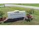 Photo of the 'North Port Florida Warm Mineral Springs Park' sign, surrounded by landscaped greenery at 140 Hermes Rd, Venice, FL 34293