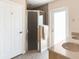 Bathroom featuring a glass enclosed shower, granite counters, and a vanity at 14124 Kewanee Ln, Port Charlotte, FL 33981