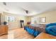 Well-lit bedroom with shuttered windows and light-colored hardwood floors at 14124 Kewanee Ln, Port Charlotte, FL 33981
