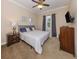 Comfortable bedroom with plush carpet, ample natural light, and a serene ambiance at 162 Palazzo Ct, North Venice, FL 34275