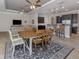 Spacious dining area open to the kitchen and living area at 162 Palazzo Ct, North Venice, FL 34275