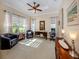 Bright office space features plush chairs, traditional desk and bright window views at 162 Palazzo Ct, North Venice, FL 34275