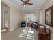 Home office features dual leather chairs, natural light, and classic wooden desk at 162 Palazzo Ct, North Venice, FL 34275