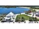 Wellen Park aerial view showcasing the lake, community buildings, green spaces, and picturesque scenery at 17515 Jadestone Ct, Venice, FL 34293