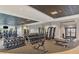 This is a gym with a full selection of dumbbells and other weight training equipment, and mirrored walls at 17515 Jadestone Ct, Venice, FL 34293